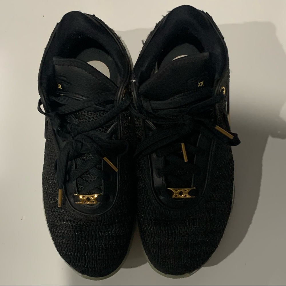 Nike LeBron 20 black and gold size 7 youth or 8.5 woman